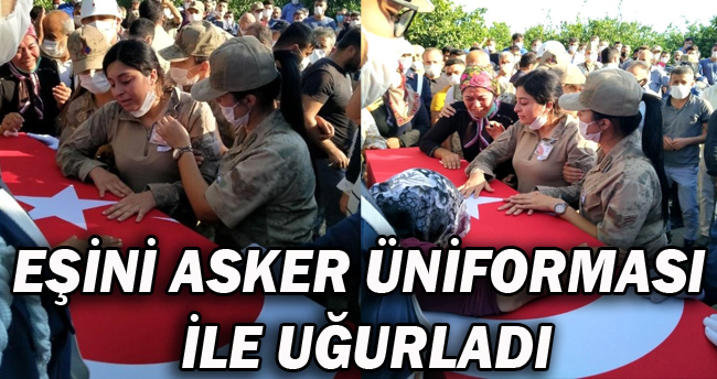 EŞİNİ ASKER ÜNİFORMASI İLE UĞURLADI